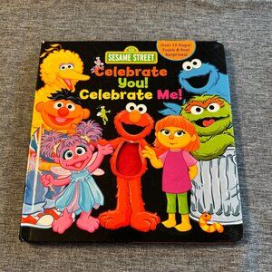 Book: "Celebrate You, Celebrate Me" a Sesame Street board book with 15 flaps